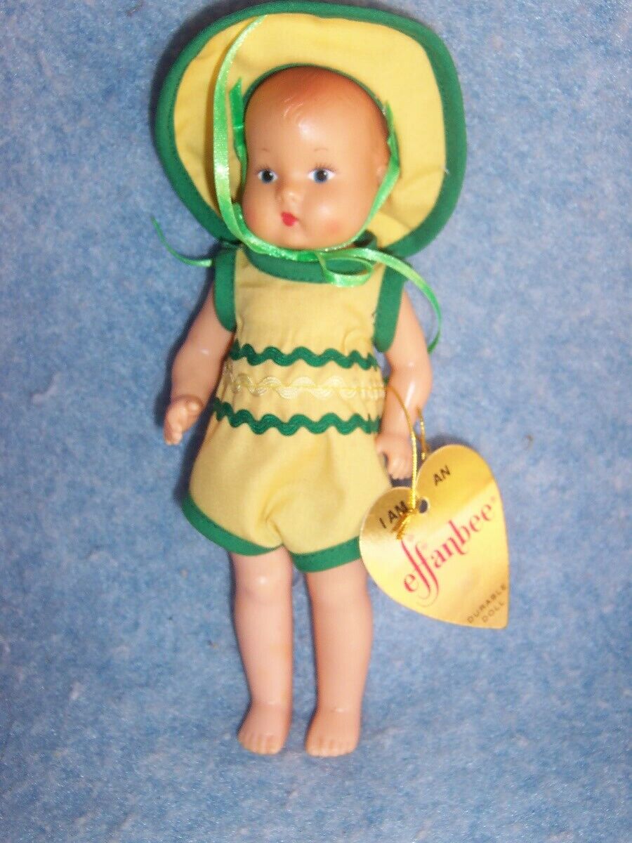 Effanbee Dolls- 7” Tinyette Yellow with doll stand #V667